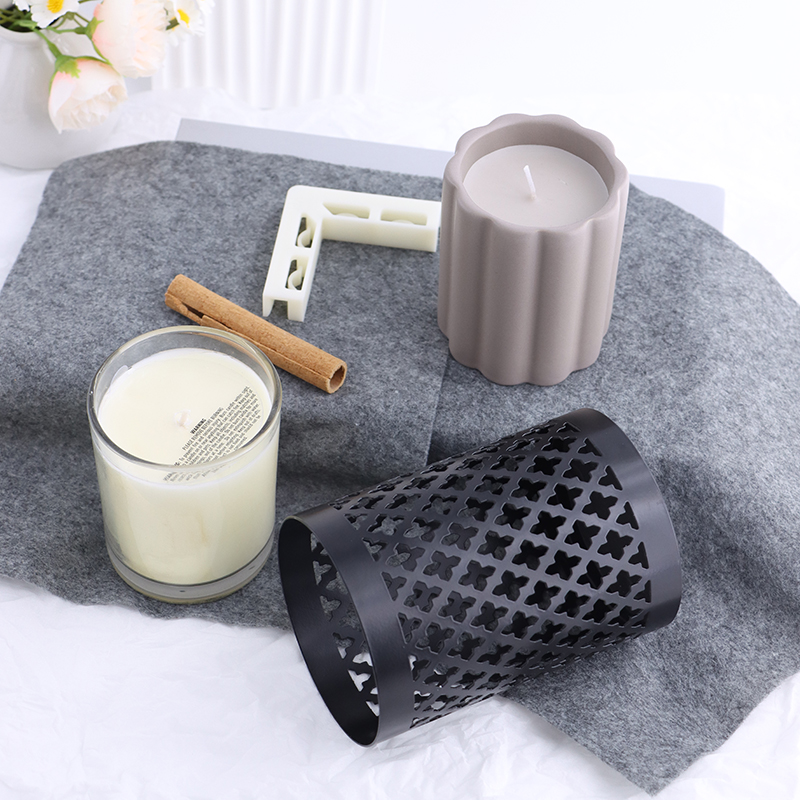 Modern Black Metal Candle Holder with Carved Design